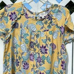 Beautiful yellow with flowers top